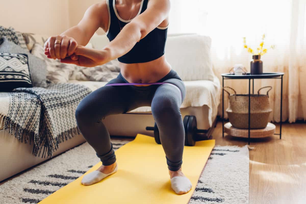 resistance band violin hips exercise