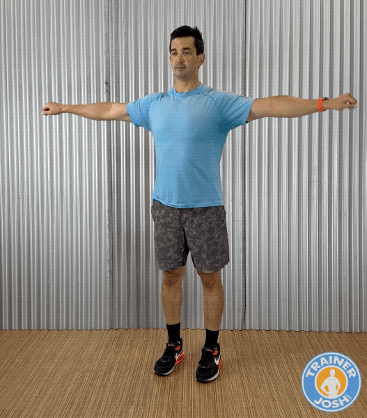 arm circles Trainer Josh demonstrating Arm Circles warm-up exercise