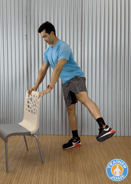 side to side leg swings Trainer Josh demonstrating side-to-side leg swings warm-up exercise