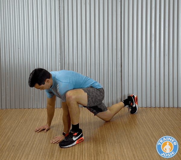 worlds greatest stretch Trainer Josh demonstrating World’s Greatest Stretch warm-up exercise